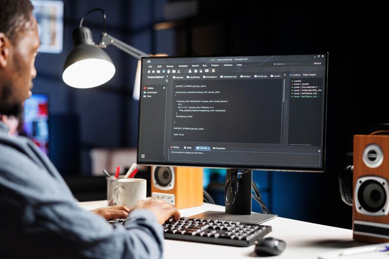 IT specialist writing code